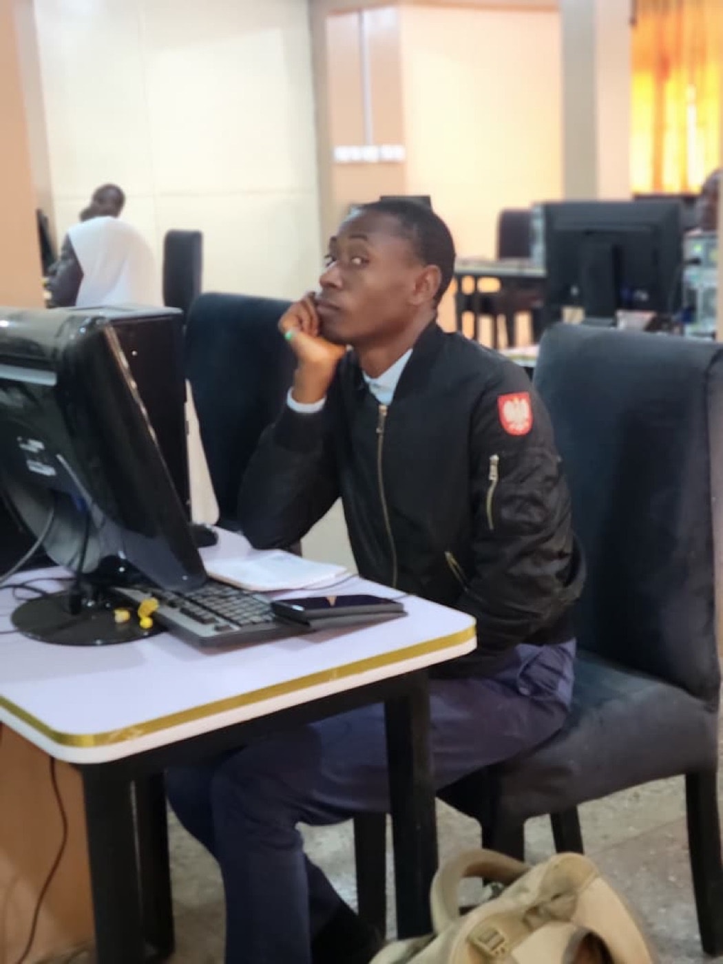 A participant working at a desktop computer during digital training