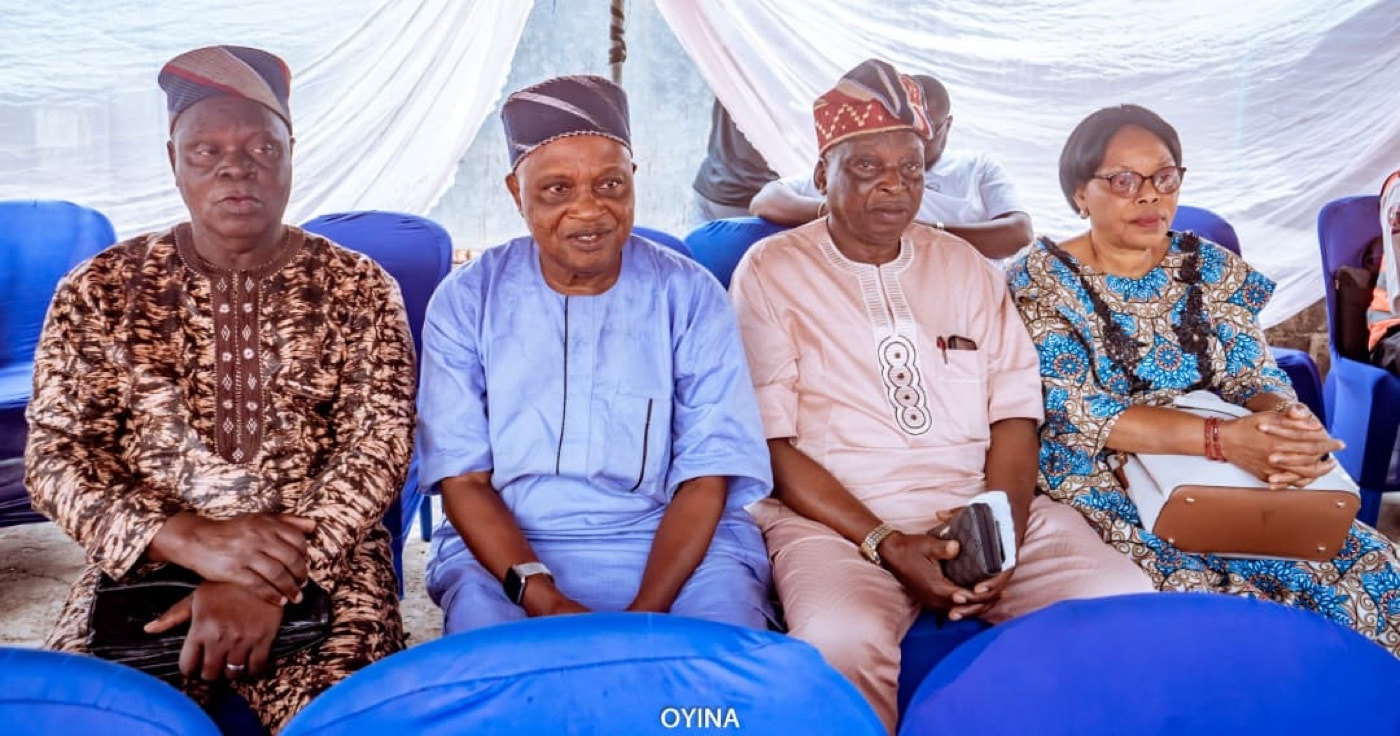 Community leaders seated together during an OYNA ceremony